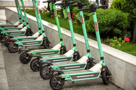 Odessa, Ukraine - July 05, 2021: Electric Push Scooters For Public Use in city, Many electric scooters for rent are very crowded.のeditorial素材