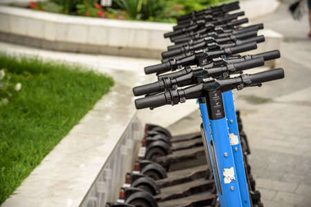 Odessa, Ukraine - July 05, 2021: Electric Push Scooters For Public Use in city, Many electric scooters for rent are very crowded.のeditorial素材
