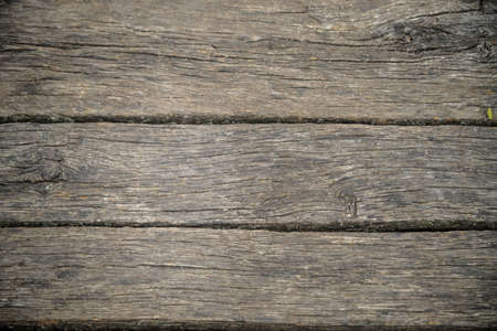 wood brown grain texture, dark wall background, top view of wooden table.