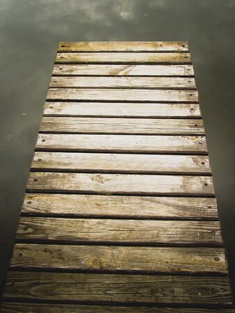 wooden pier over a river
