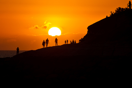 Solar sunset silhouettesの写真素材