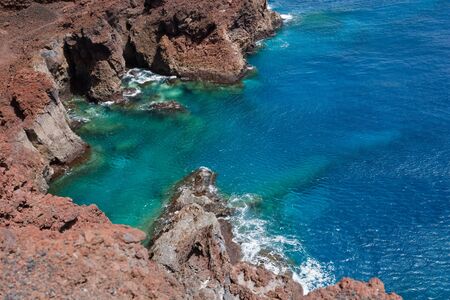 rocks with ocean blue waterの写真素材