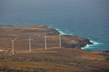 wind turbines on the ocean shore