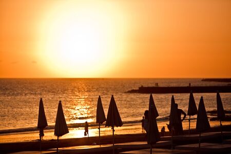 Solar sunset silhouettesの写真素材