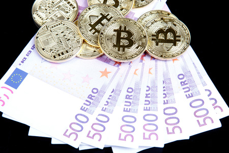 bitcoin coins with eurosの写真素材