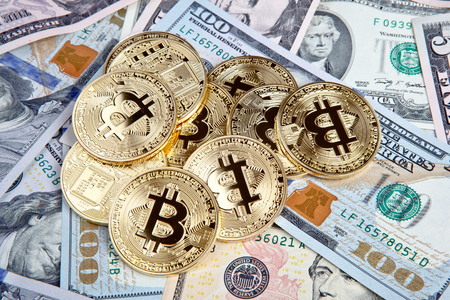 bitcoin coins with dollars