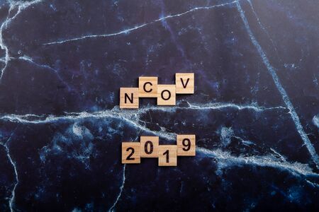 ncov coronavirus wooden word