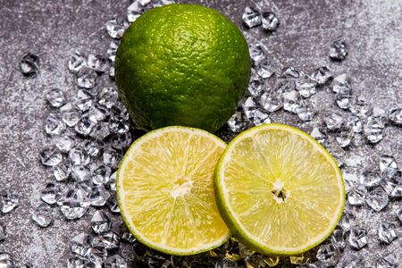 fresh lime slices on the iceの写真素材