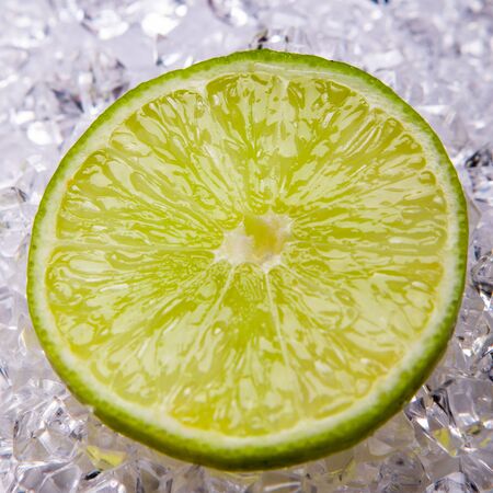 fresh lime slices on the ice