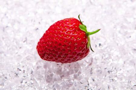 fresh strawberry on ice cubesの写真素材