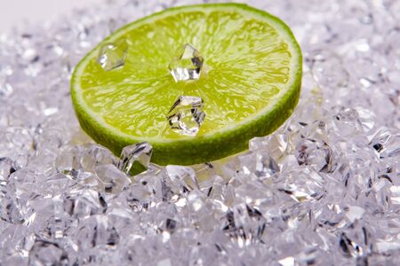 fresh lime slices on the ice