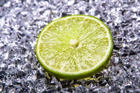 fresh lime slices on the iceの写真素材