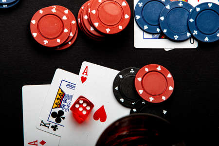 casino with dice on cards with whiskeyの写真素材