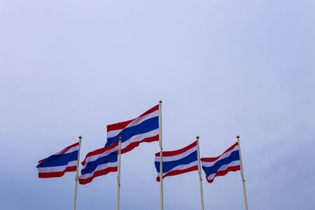 Thai flags waving in the wind.