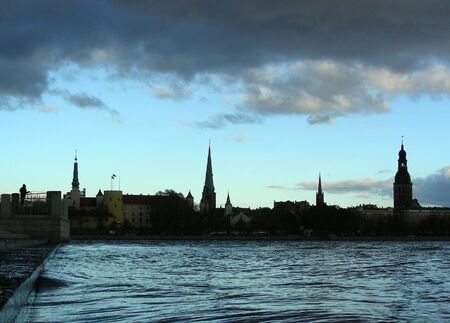 silhouette of panorama of old Riga, Latvia nearby river Daugava