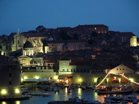 Bautiful view to Dubrovnik old harbour by night          の写真素材