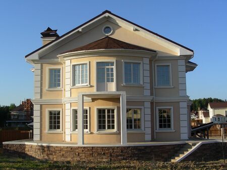 Newly erected building in village at suburb of city          の写真素材