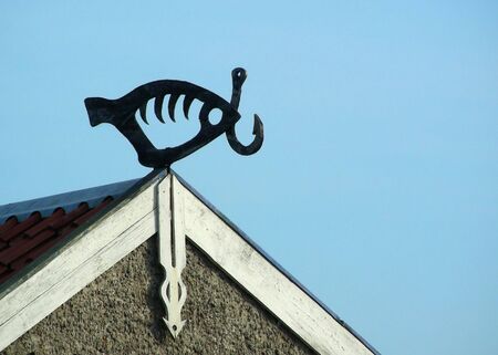 Fish shaped weather-vane in fishermen village Nida at Lithuaniaの写真素材