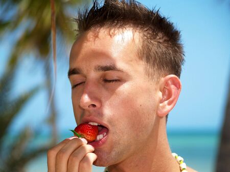 Strawberry Attack on the beach in Key West        の写真素材