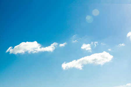 Blue sky with sun and cloud. Nature background. の写真素材
