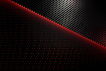 abstract background with carbon fiber and red light.の素材