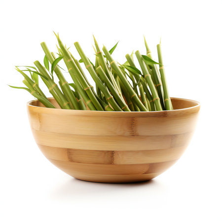 Bamboo in a wooden bowl isolated on a white background cutoutの素材