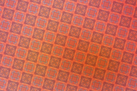 Abstract background with geometric pattern in red, orange and yellow colors.