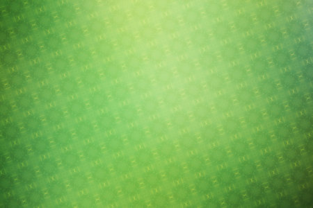 Green abstract background with hexagon pattern and blurred bokeh.の写真素材