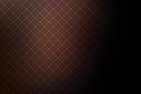 Dark brown background with a pattern of squares.