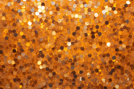 golden glitter christmas abstract background with bokeh defocused lightsの素材