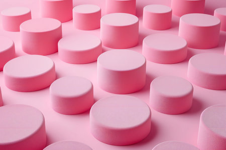 Pink round podiums on a pink background. Abstract background and texture.の素材