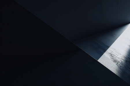 Abstract dark room with concrete floor and sunlight.の素材