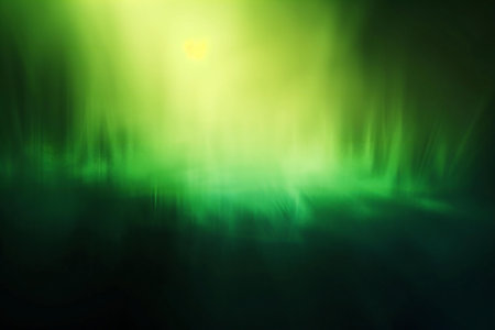 abstract green background with rays of light and bokeh.の素材