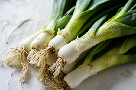 Fresh spring onions on a white background. Selective focus. nature.の素材