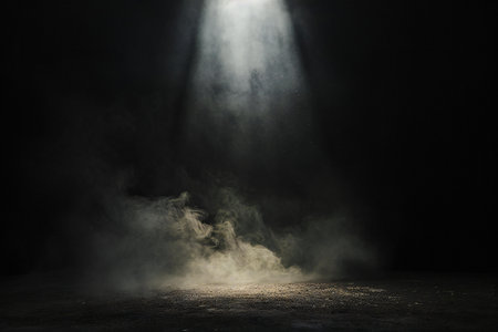 Light from the spotlights on a dark background with smoke and fogの素材