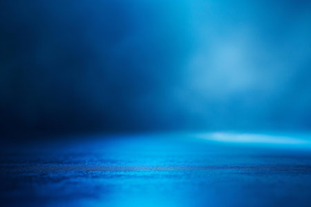 Blue light background. Abstract blue background. Blue background with blue spotlightの素材