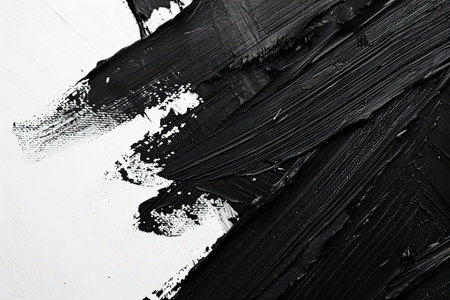Black paint brush stroke on white background. Abstract acrylic painting texture.の素材
