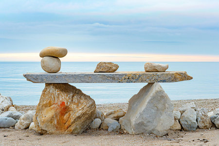 Stones on a bench in the sea. Beautiful seascape.の素材