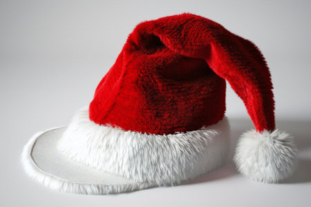 Santa Claus red hat on white background. Christmas and New Year concept.の素材