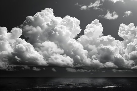 Digital artwork of black background with white clouds. clouds isolated on black background. black and white, high resolution photographyの素材