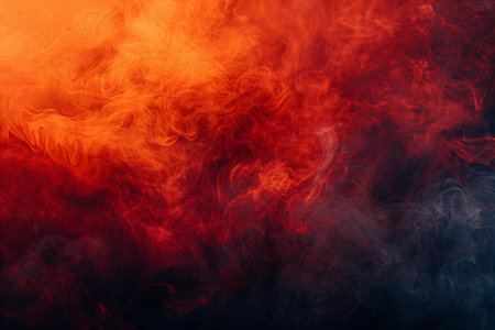 Dense multicolored smoke of  red and blue colors on a black isolated background. Background from the...