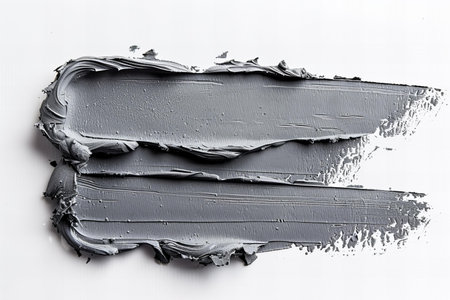 Strokes of black paint on a white background close-up