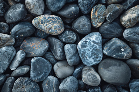 Pebbles on the beach. Background texture. Toned.
