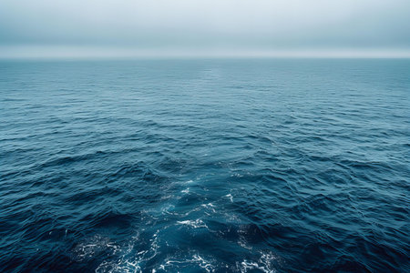 Beautiful seascape with blue sea and fog in the morningの写真素材