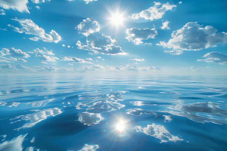 blue sky with clouds and sun reflected in the sea, nature seriesの写真素材
