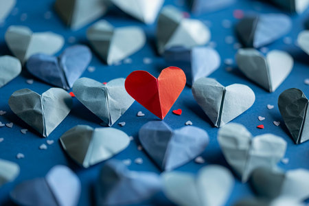 Paper hearts on a blue background. Valentine's Day concept. Copy space.の写真素材
