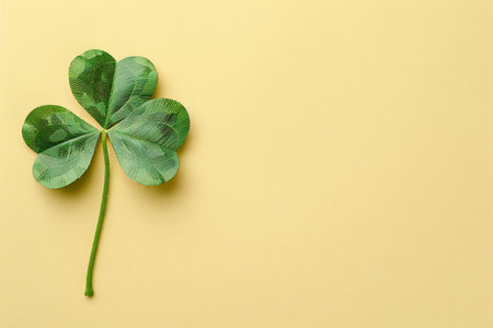 Clover leaf on yellow background. St. Patrick's day concept