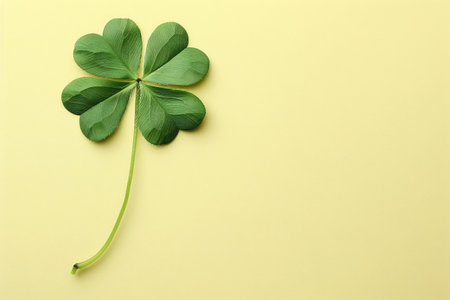 Clover leaf on yellow background. St. Patrick's day concept