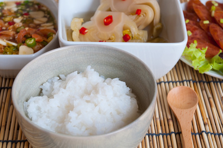 Soft boil rice with other food in Thai styleの写真素材