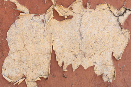 Old color skin on cement wall texture for background useの写真素材